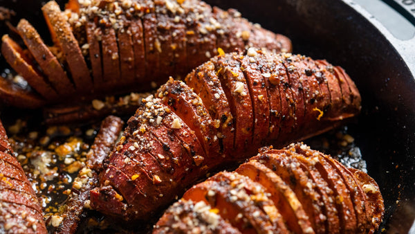 Candied Hasselback Sweet Potatoes with Cinnamon-Orange Butter