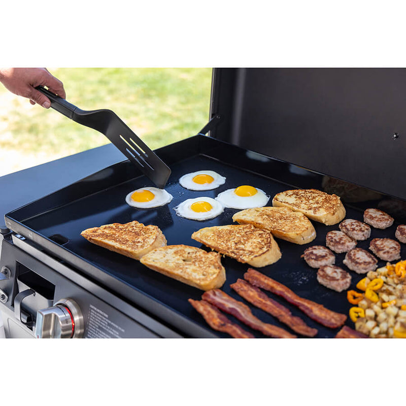 Louisiana Grills 4-Burner Gas Griddle with Ceramic Top. cooking breakfast on griddle top